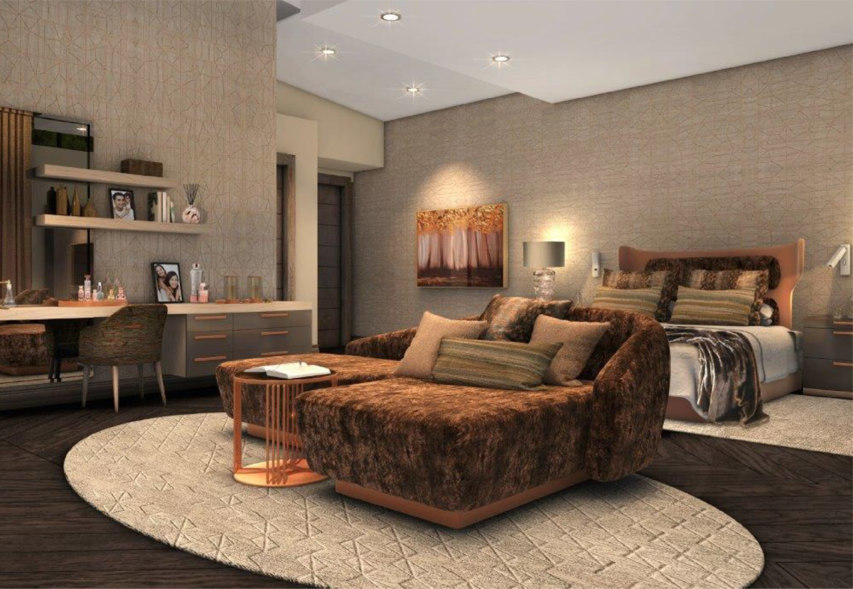 Bedroom with a sitting area and dressing table.